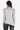 Back view highlighting the elegant and trendy design of the cold shoulder knit top, Light Grey
