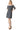 Model showcasing the mini dress paired with elegant heels for a complete look.