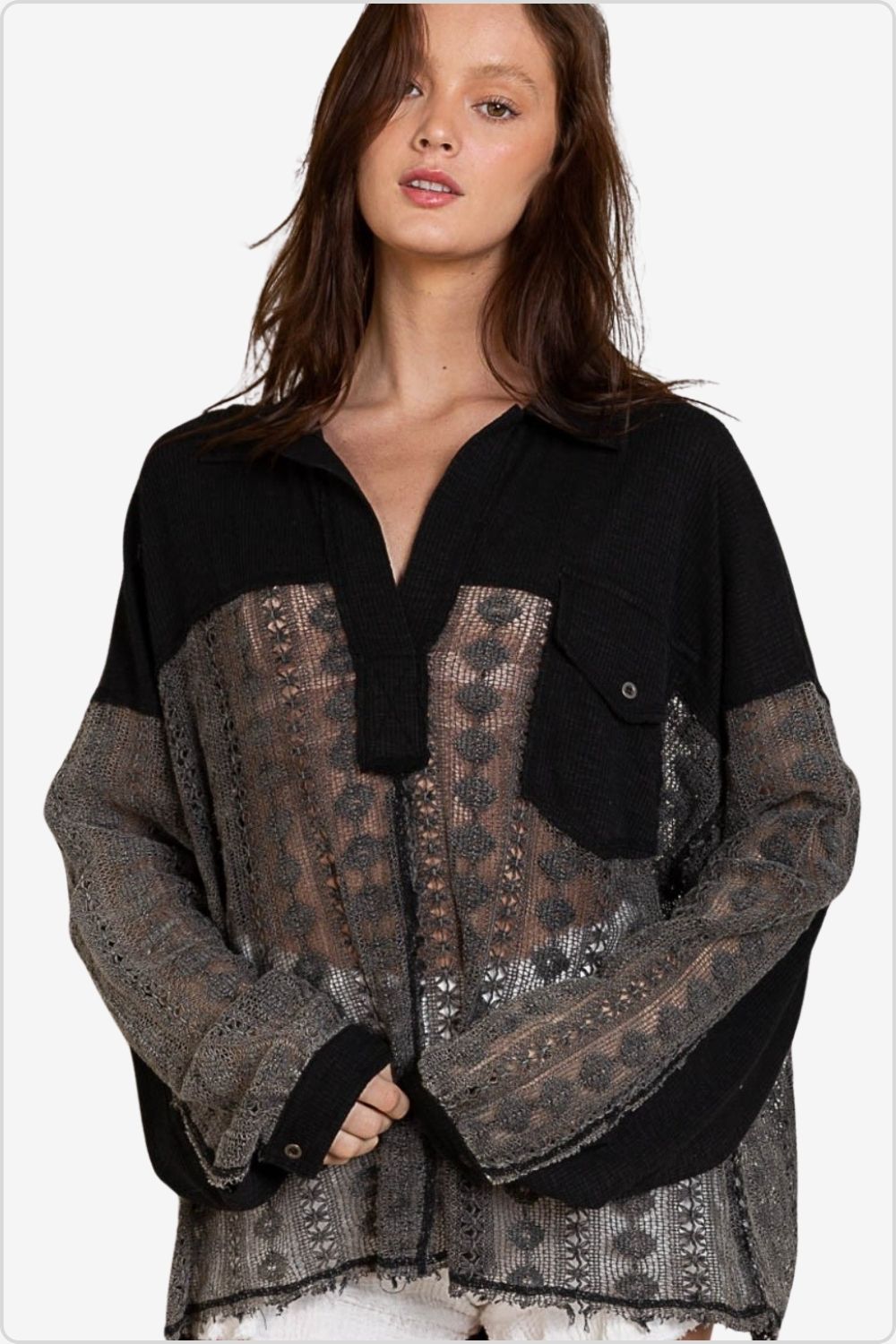 Fashionable black lace blouse with Johnny collar and long sleeves, ideal for elegant layering
