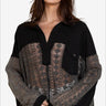 Fashionable black lace blouse with Johnny collar and long sleeves, ideal for elegant layering