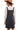 Back view of the wide strap overall dress, featuring a classic denim style in black.