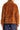 Back view of fuzzy zip-up jacket showcasing soft texture and clean silhouette.
