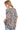 Back view of the leopard t-shirt, highlighting the exposed seam details and relaxed fit.