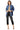 Model styling the drop shoulder denim shacket with high-waisted black jeans and white heels for a trendy, laid-back look.