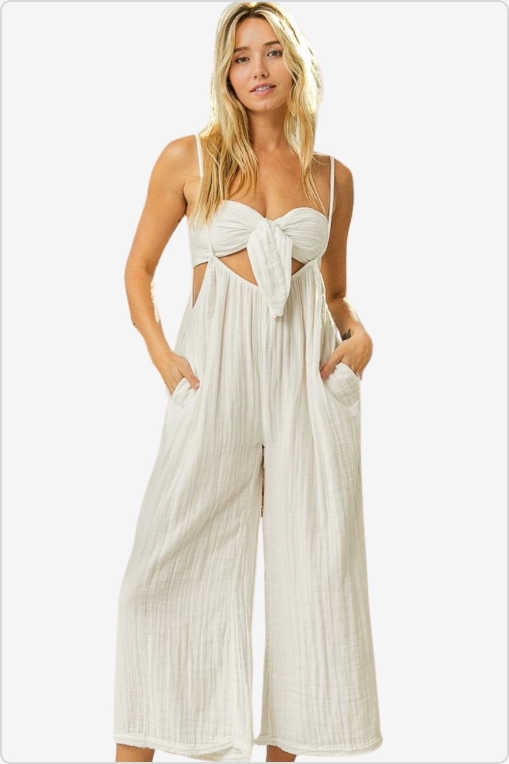 Trendy cream ruched tie-front tube top with coordinating suspender pants for a stylish summer look