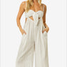Trendy cream ruched tie-front tube top with coordinating suspender pants for a stylish summer look
