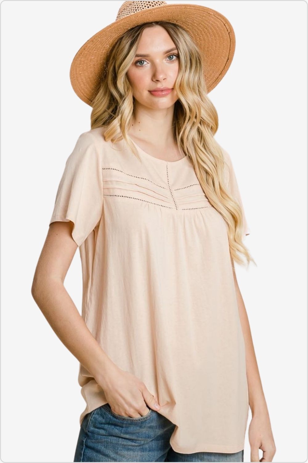 Stylish woman in an eyelet detailed round neck tee, ideal for any occasion., Color Peach