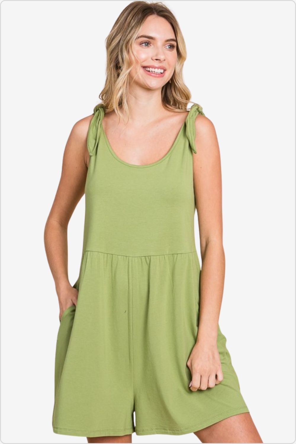 Stylish woman in a Shoulder Knot Baggy Romper, ideal for casual summer days, Color Happy Olive
