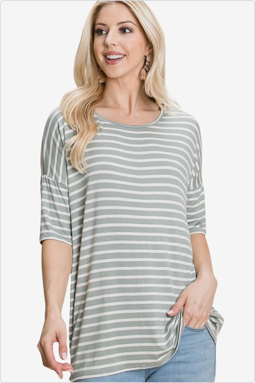 Fashionable woman in a classic striped round neck t-shirt, perfect for versatile outfits, Color Sage