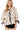 Women's bow print tie front babydoll blouse in Cream, showcasing the playful bow pattern and peplum waist.