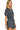Side view of women's striped romper, highlighting the drawstring waist and functional pockets.