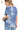 Back view of dusty blue T-shirt, highlighting smooth silhouette and tie-dye pattern.