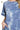 Close-up of tie-dye pattern and round neckline, showing soft and stretchy fabric.