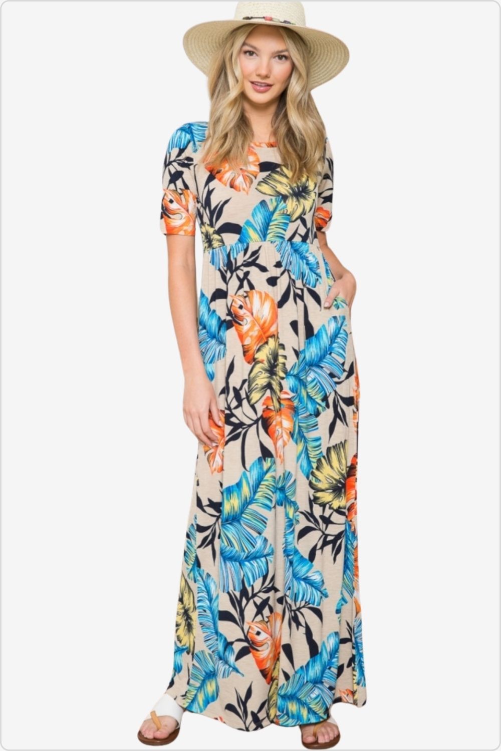 Woman wearing a stylish printed maxi dress with a round neckline, perfect for versatile fashion, Color Taupe