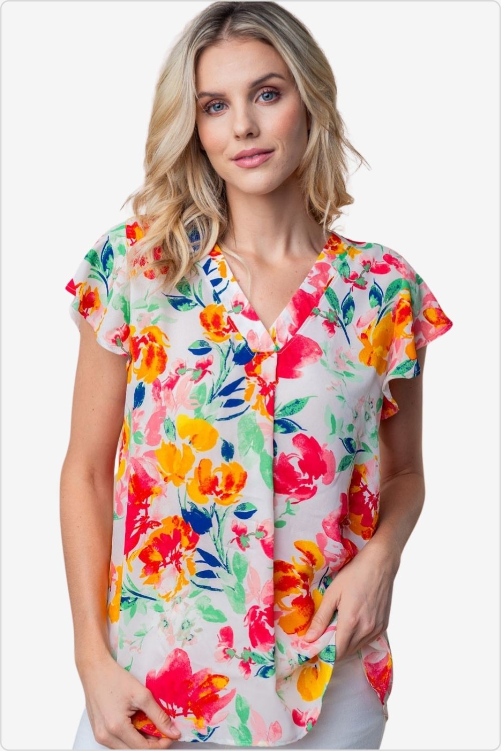 Stylish woman in a floral woven short sleeve top, perfect for both casual and formal settings, Color White Multi