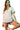 Model in striped V-neck tee with high-waisted shorts for a summer walk