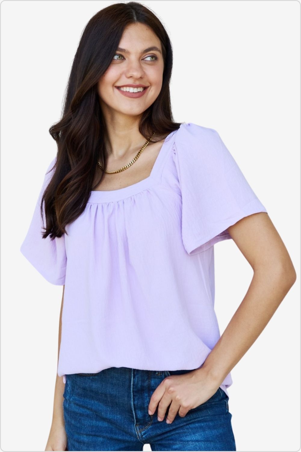 Woman in square-neck short sleeve lavender blouse