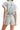 Back view of the romper showcasing its relaxed and casual design.