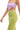 Close-up of ribbed knit fabric and side cutout on lime color block dress.