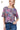 Model wearing mauve printed T-shirt with high-waisted jeans.