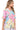 Side view of floral top, showcasing lightweight fabric and soft drape.