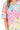 Close-up of floral print and structured collar.