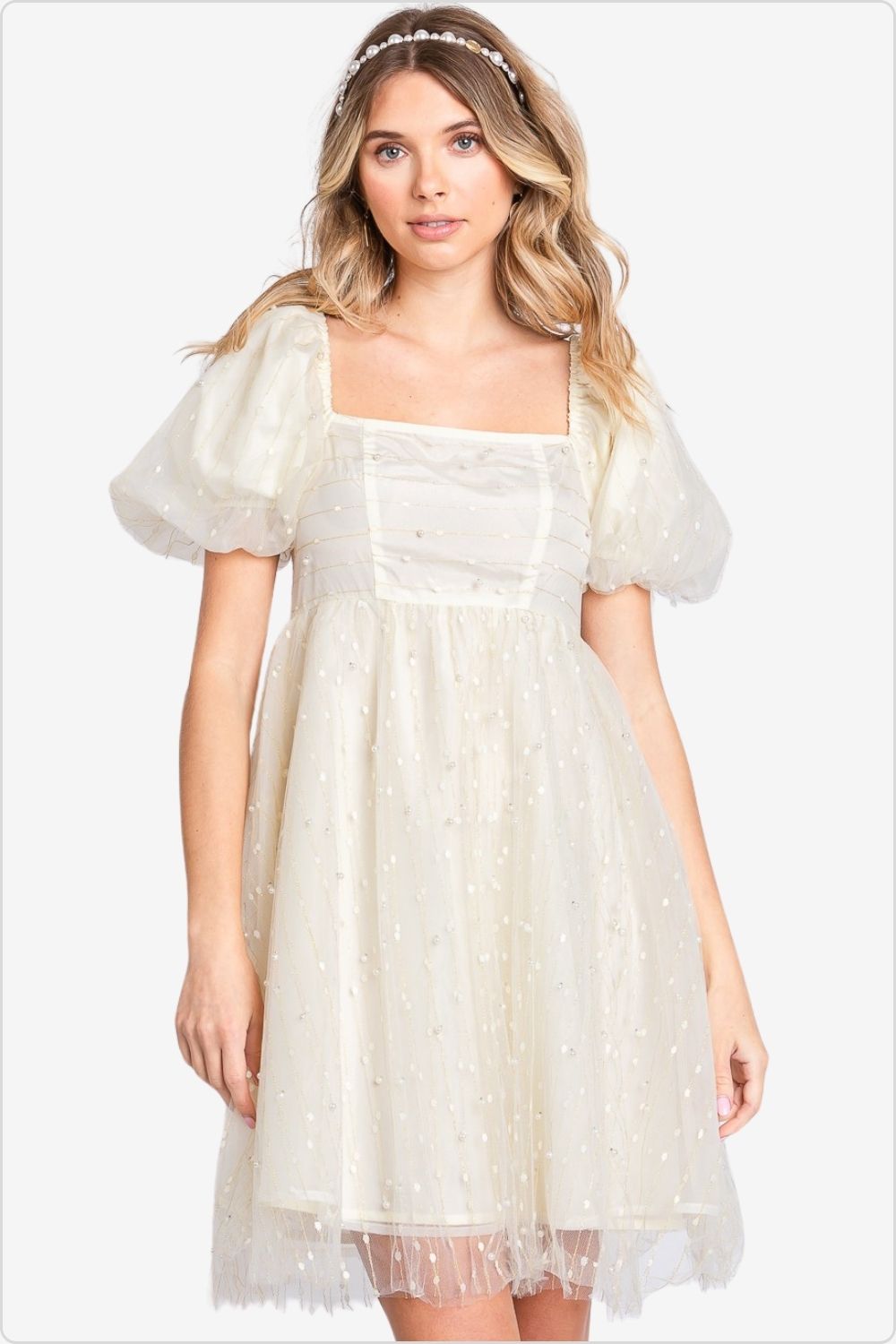 Elegant pearl-embellished mesh babydoll dress, perfect for special occasions.