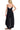 Back view of women's black overalls, highlighting adjustable straps and flowy wide-leg design.