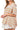 Side view of striped t-shirt with star patch showing comfy cotton fit for women