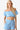 Stylish off-shoulder crop top and high-waisted shorts set, perfect for summer fashion, Color Light Blue
