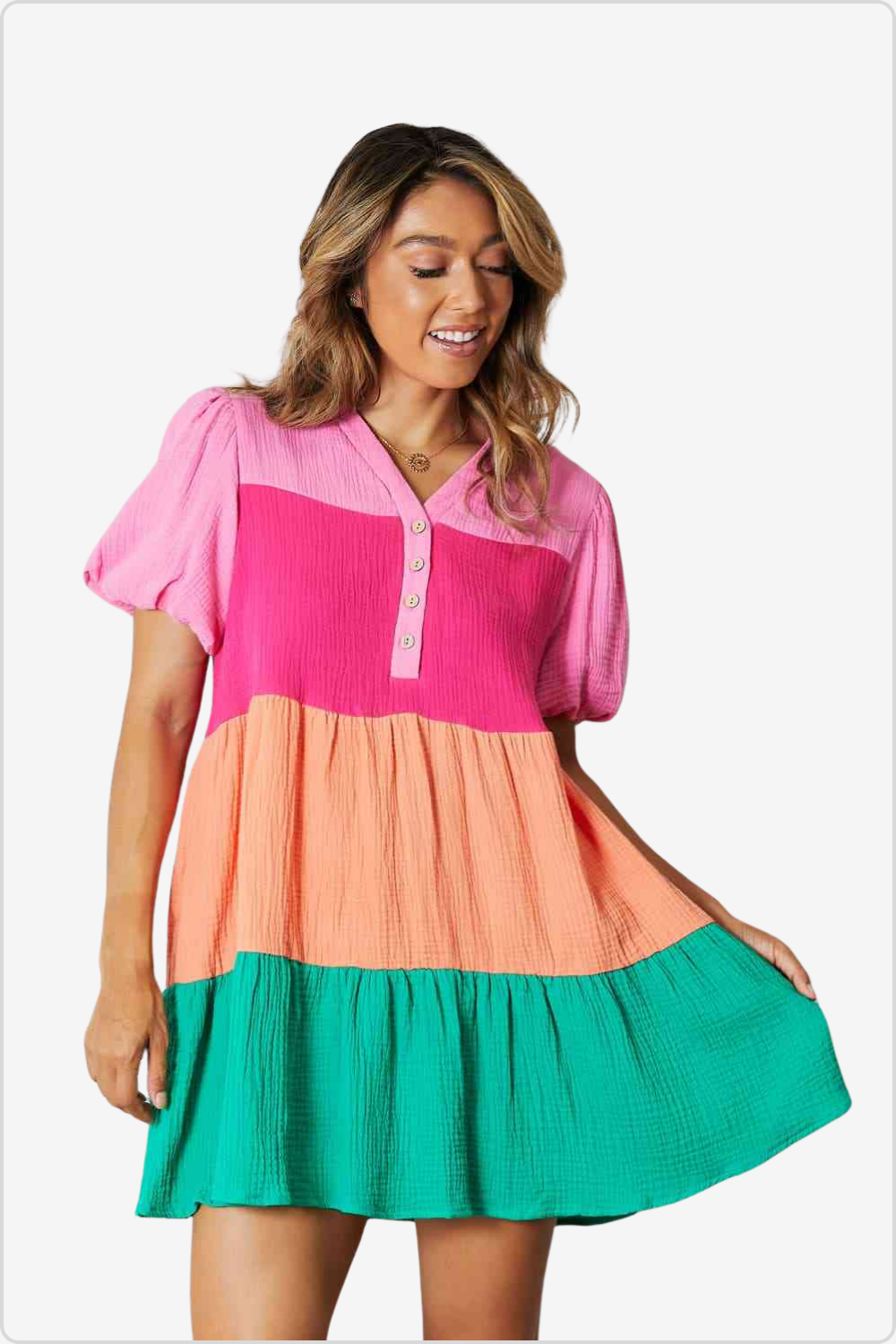 Model Showcasing Trendy Color Block Mini Dress with Puff Sleeves