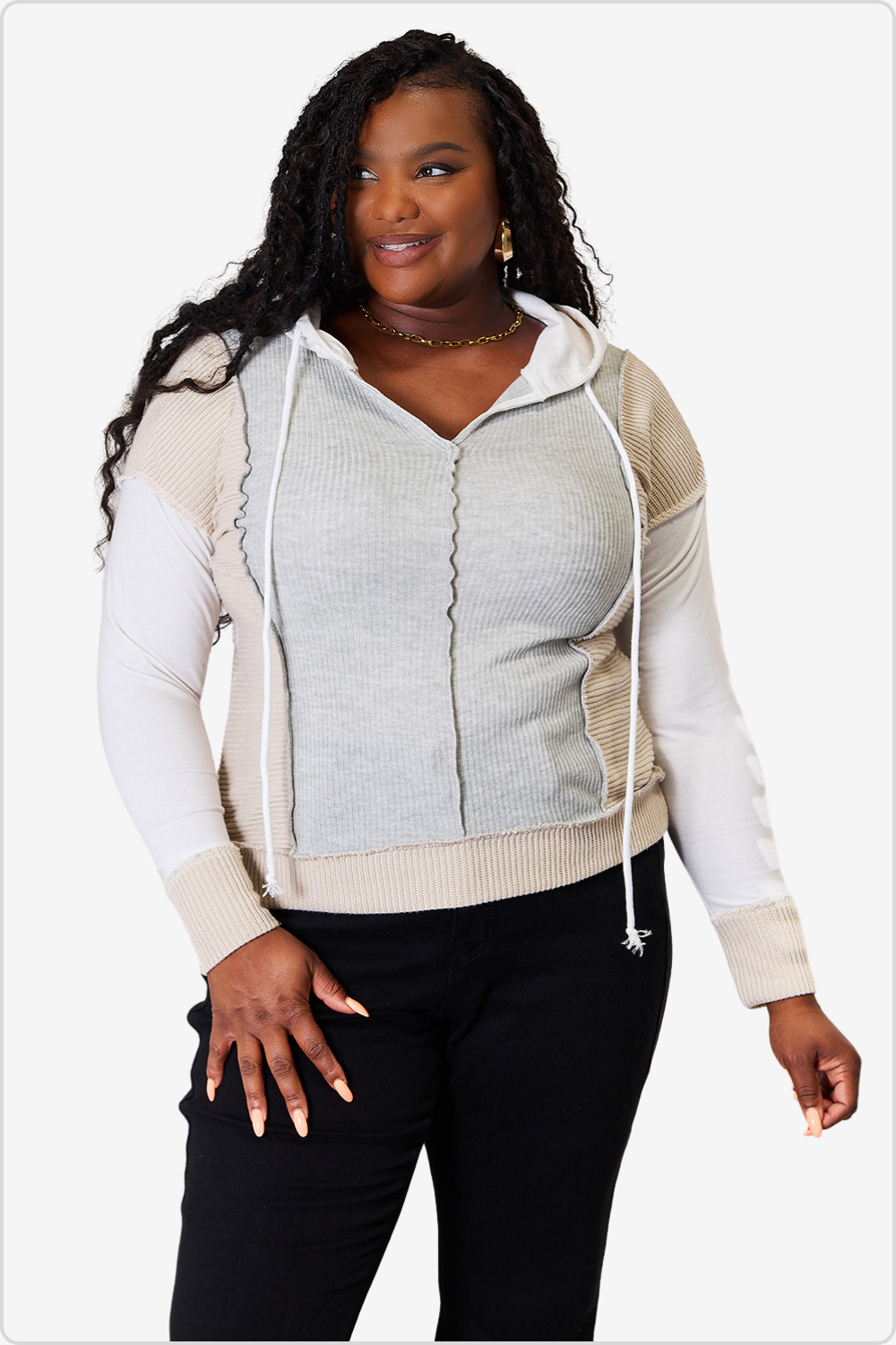 Chic color block hoodie with exposed seams and a drawstring, front view
