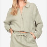 Elegant textured button-up shirt and shorts set, perfect for a chic summer look