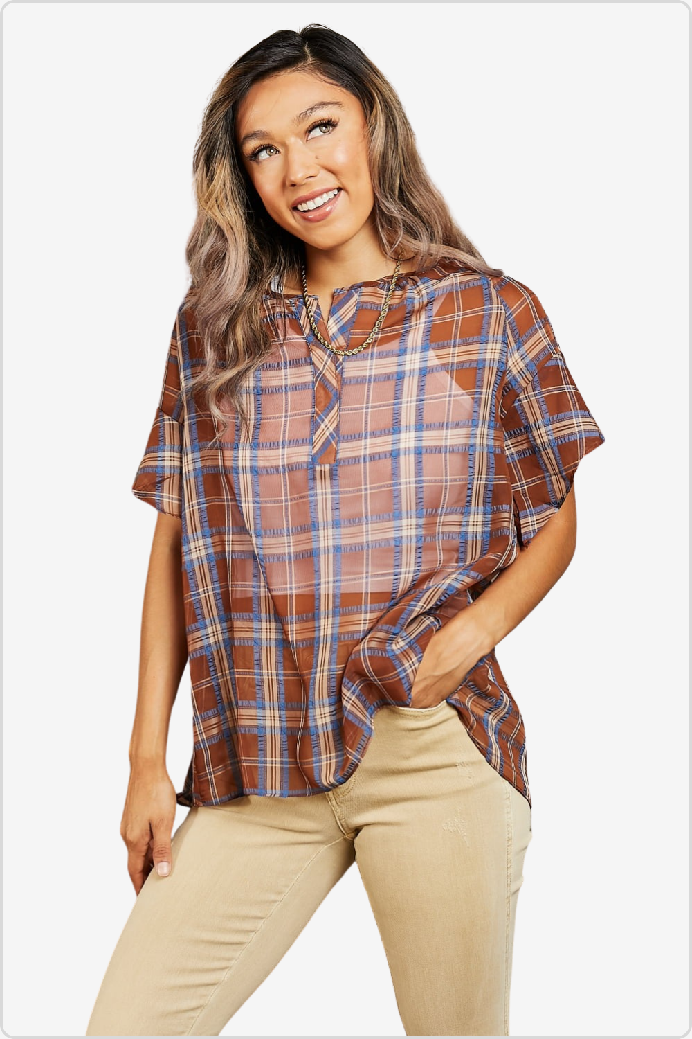 Chic plaid V-neck top with a flowy silhouette, showcasing casual elegance.