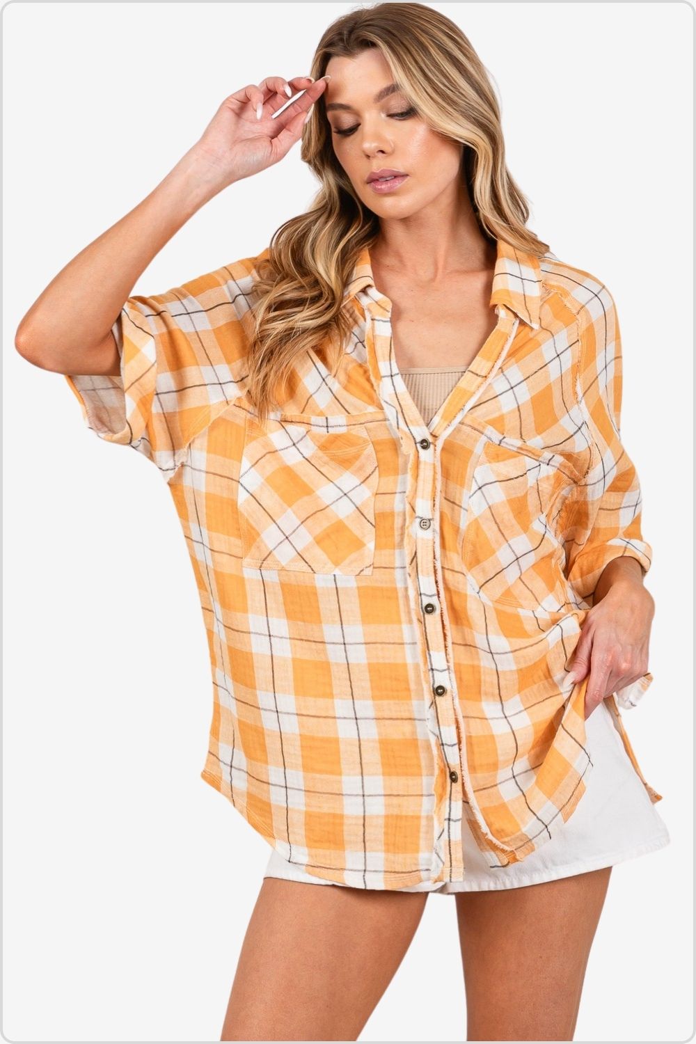 Classic plaid button-up shirt with side slits, front view