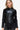 Stylish women's black faux leather jacket with a zip-up design and sleek fit.