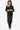 Women's faux leather hooded jacket showcasing its smooth black finish and zippered details.