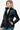 Stylish black faux leather jacket with pockets, side view on model.