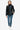Women's black faux leather puffer jacket with turtleneck design, front view.