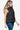 Side angle of the vest, featuring zippered pockets and a streamlined fit.