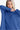 Light navy brushed melange hacci turtleneck sweater, shown on model for a chic winter look.