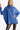 Women's soft hacci turtleneck sweater in light navy, showcasing a relaxed fit.