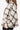 Side view of Women's Cream Plaid Jacket with classic plaid design and side pockets.