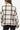 Back view of Women's Cream Plaid Long Sleeve Jacket, highlighting bold plaid pattern.