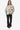 Women's Cream Plaid Jacket styled over a beige top, paired with black pants for a chic look.