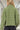 Back view of the green plaid tweed jacket, showcasing the classic pattern and comfortable fit.