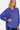Side view of the women's high-low Henley sweater, showing relaxed fit and hemline.
