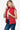 Side view of Women's Red Zip-Up Vest, highlighting the turtleneck and pockets.