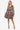 Women's multi-floral V-neck dress styled with a layered design on the model.