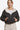 Women's reversible cropped Sherpa jacket with a zip closure.
